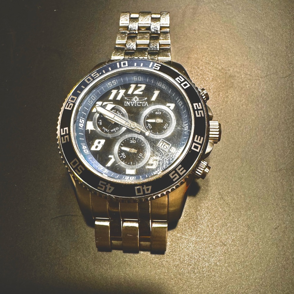 Invicta Silver and Black Dial Watch